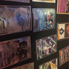 Pokemon cards and collectable marshadow tin The photo with the sleeve cards for