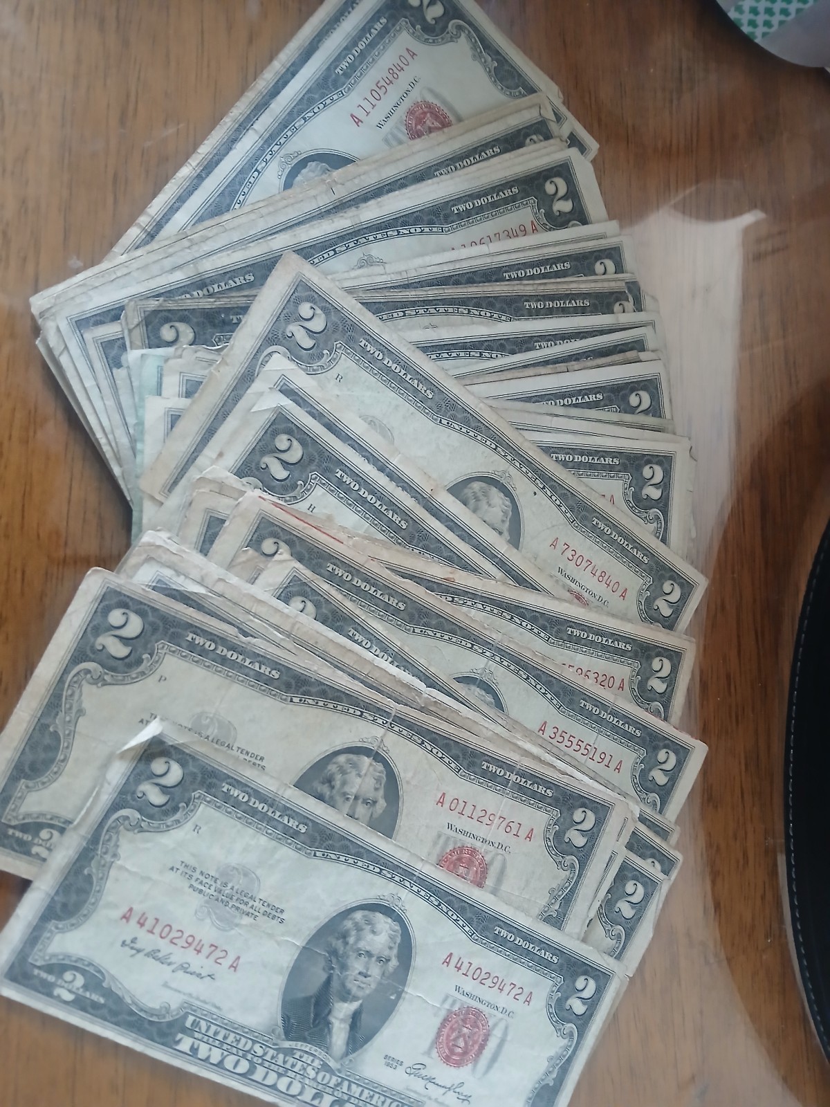 50 Red seal two dollar bills