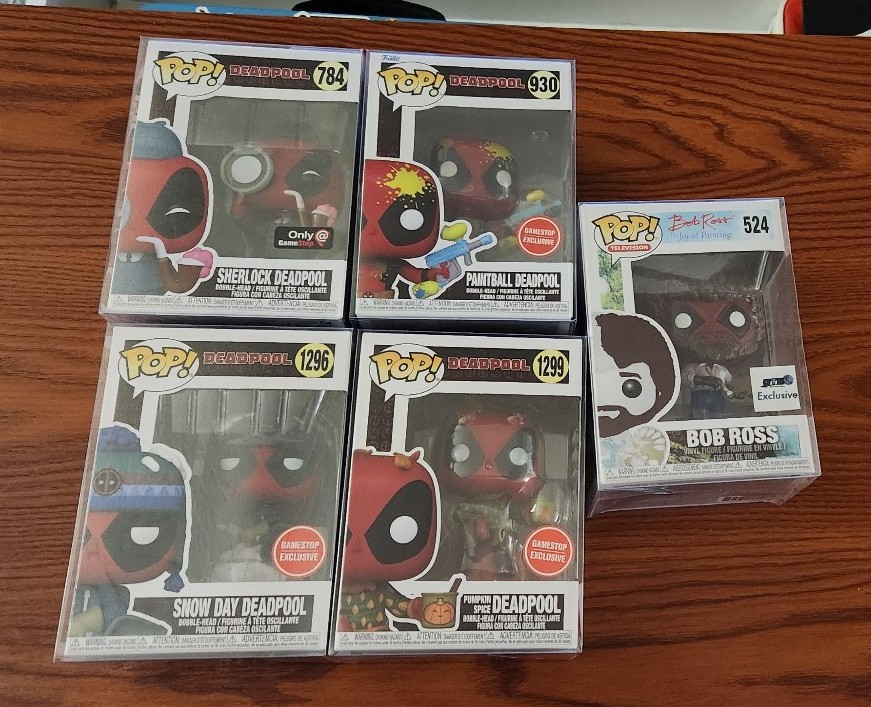 Lot of 5 Deadpool Gamestop Exclusive funko pops in protectors