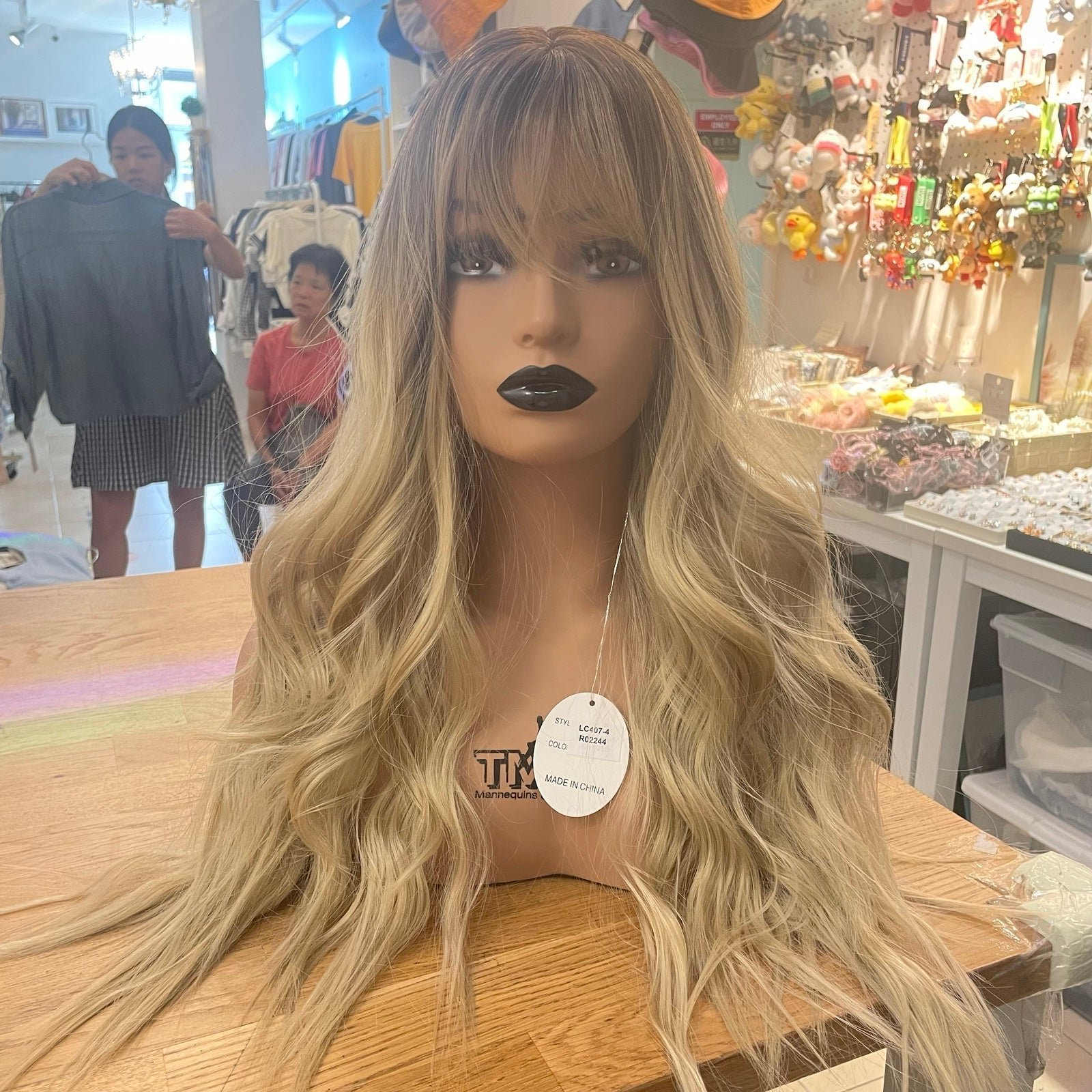 Human hair ombre blonde wavy wig with bang.
