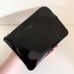 NWOT Givenchy patent zippy pouch clutch