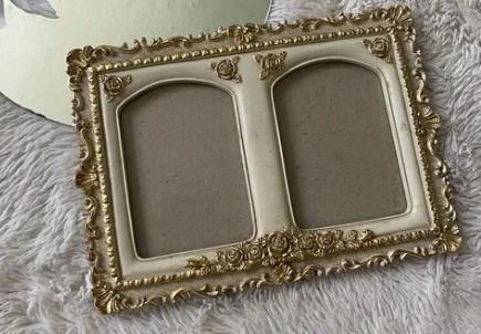 Rose-accented cream frame