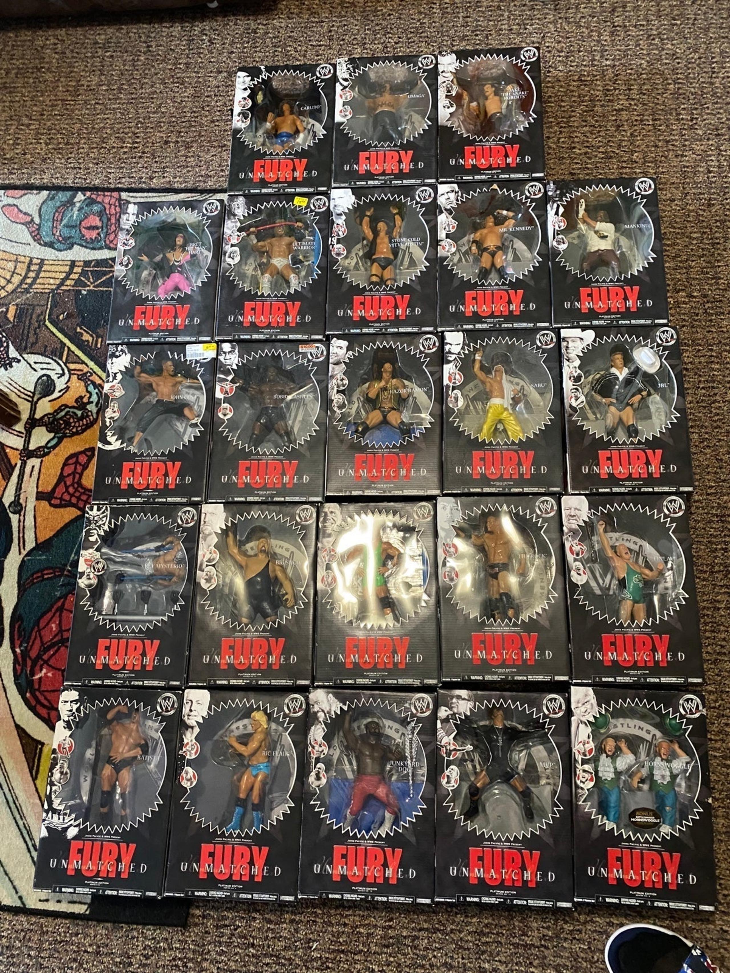 Lot of WWE Unmatched Fury Collectible Figures  Never Opened. See Description!!!