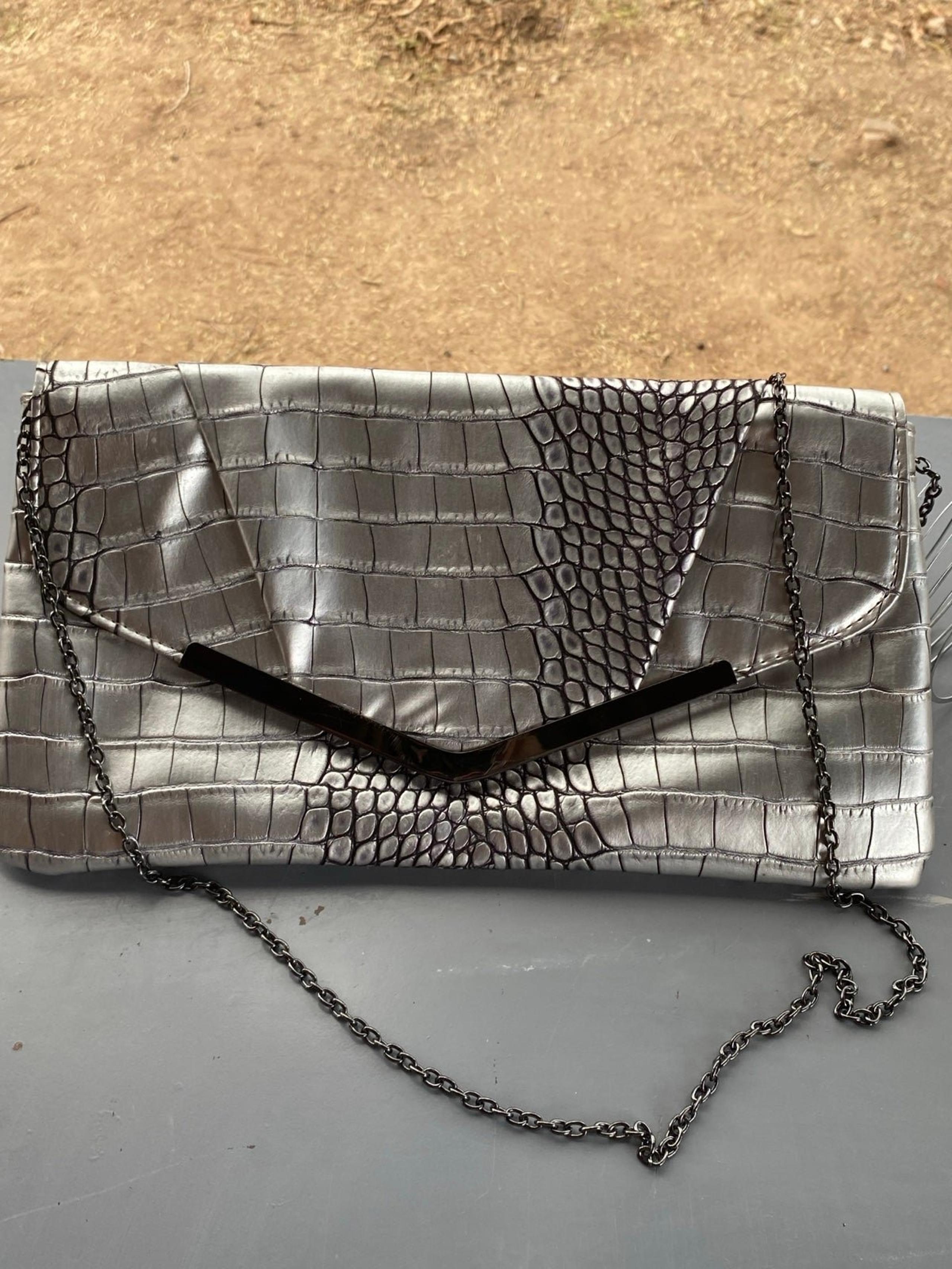 Jessica McClintock silver snakeskin clutch
