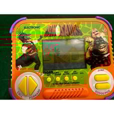 1990 DINOSAURS TIGER ELECTRONIC Handheld Electronic Game Works