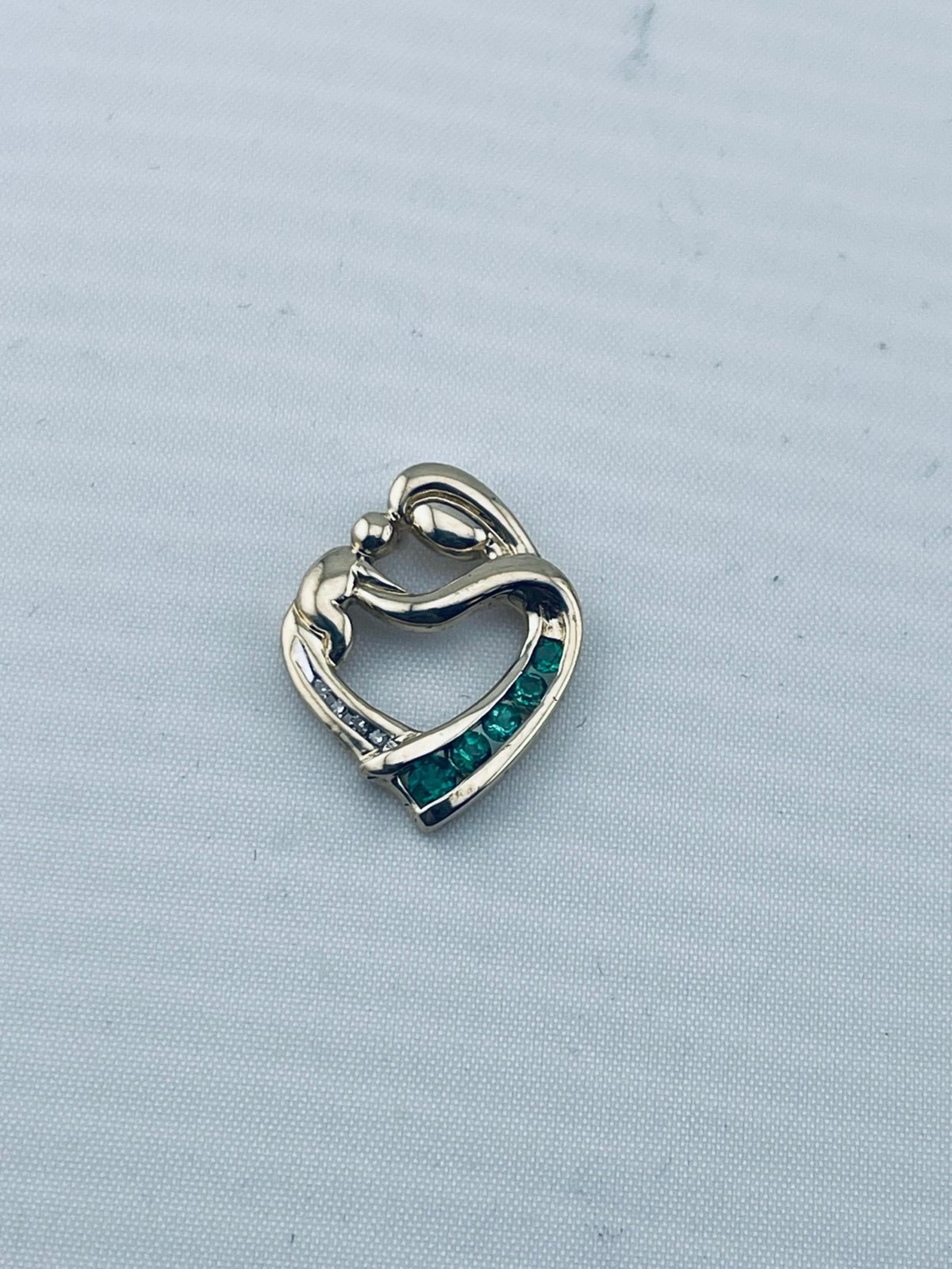 Vintage emerald and diamond, heart mother and child pendant 14 karat yellow gold