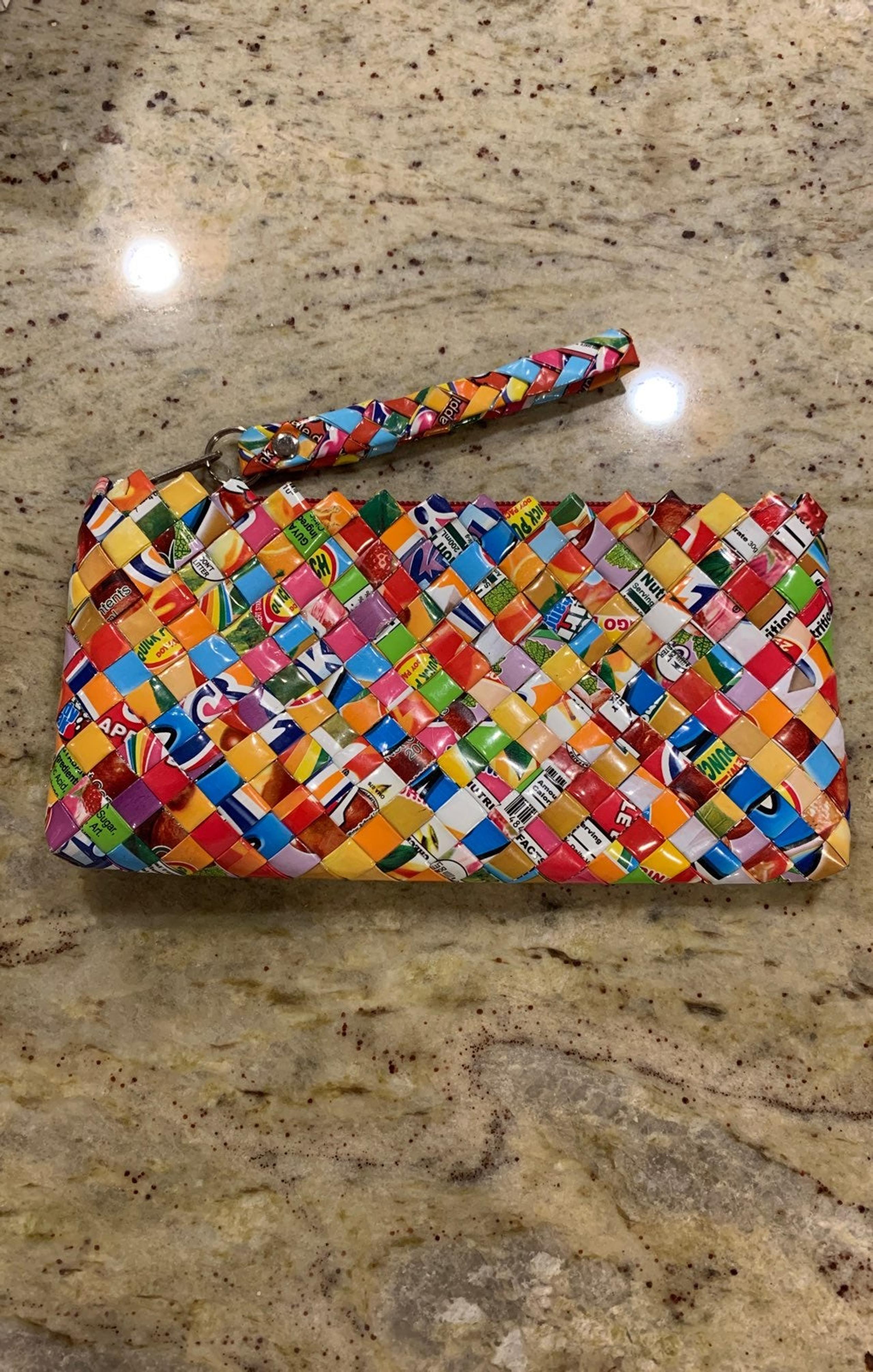 Nahui Ollin clutch purse