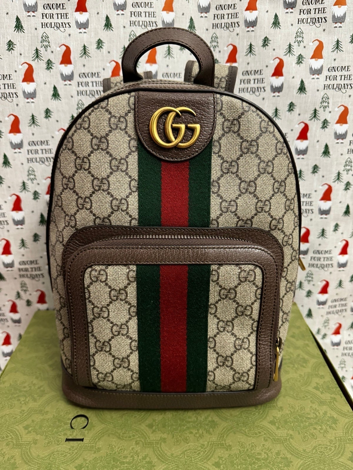 Gucci mini backpack and wallet .