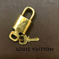 Authentic Louis Vuitton padlock and key