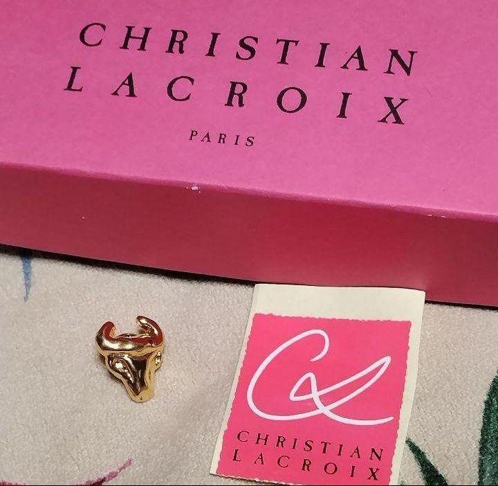 Brand new Christian Lacroix brooch with a buffalo motif in gold, unused.