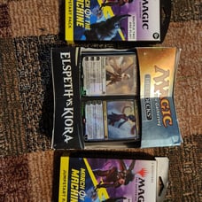 Elspeth and Kiora sealed Duel Decks with 2 double Jumpstart MoM booster packs