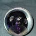 Purple ball paperweight