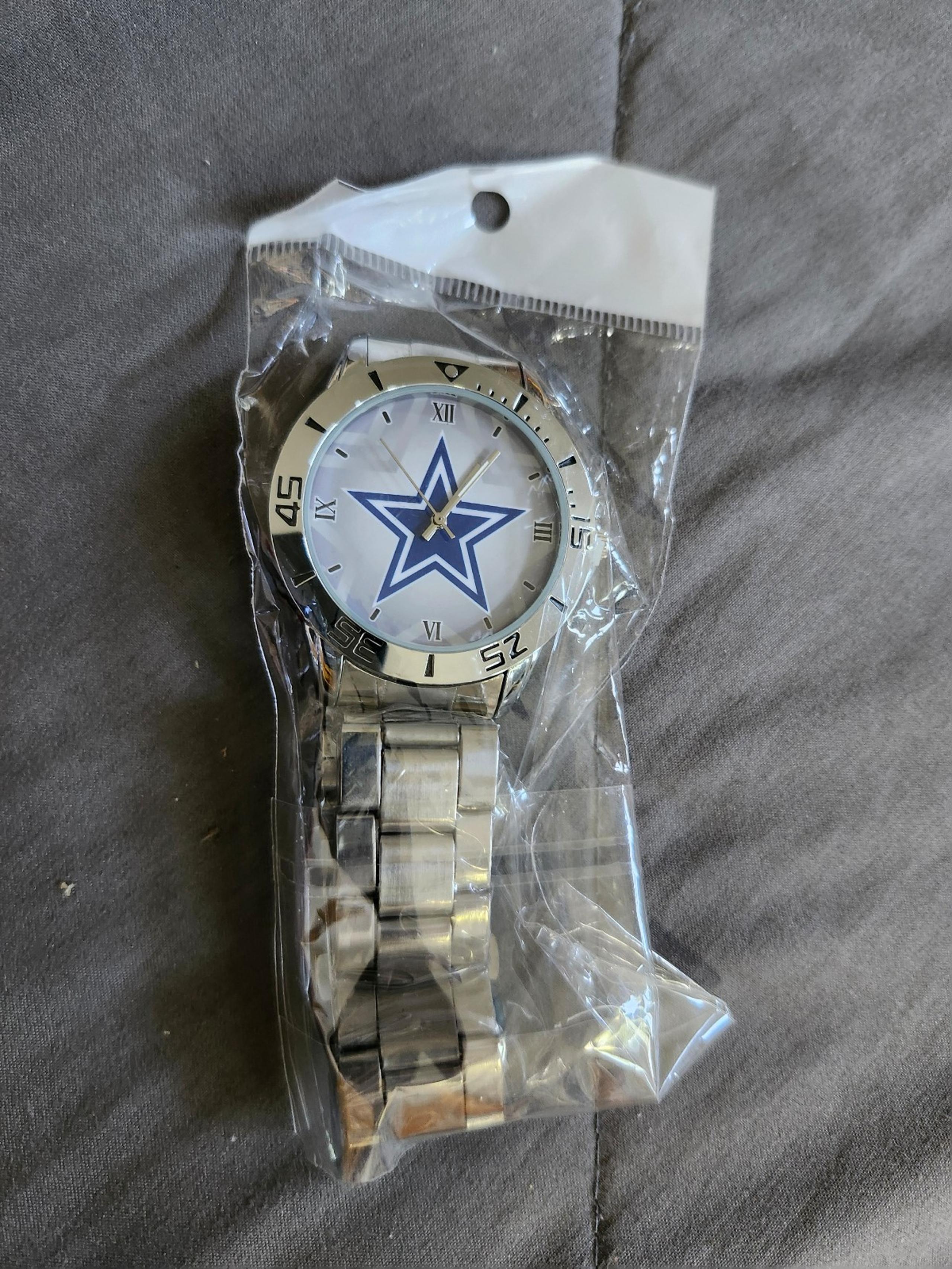 New Sealed Dallas Cowboys Mens Watch in New Sealed Condiction.  Never Opened.
