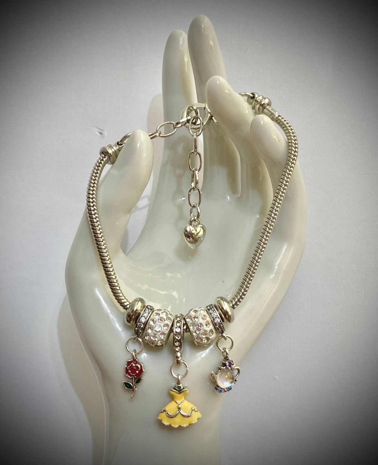 Beauty and The Beast Disney inspired bracelet and cosmetics bag.