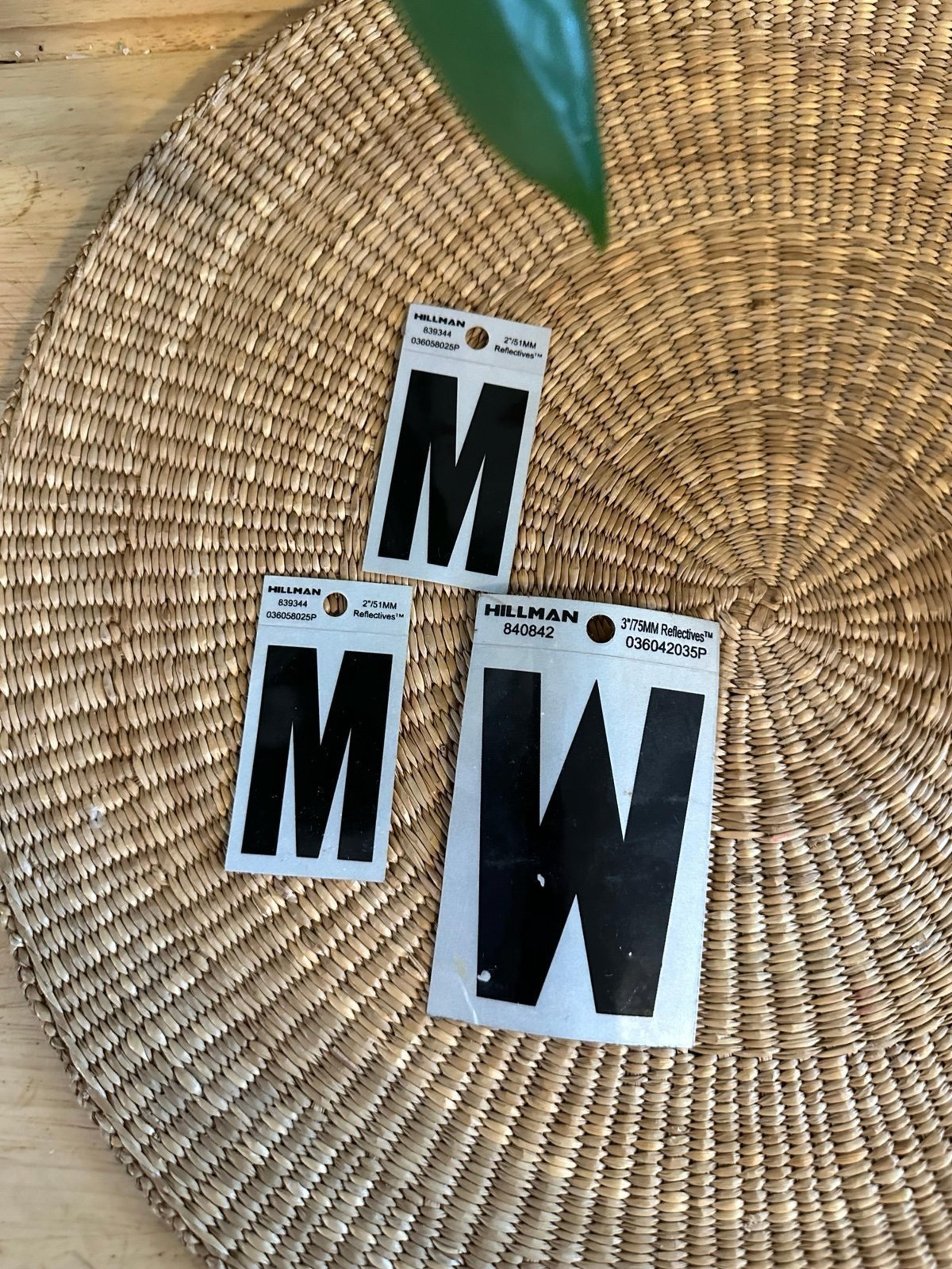 Hillman Sign Center (2) M’s & (1) W reflective letters