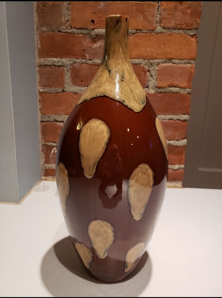Large brown vase, with light beige teardrop designs throughout