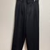 Black slacks size M, made of polyester.