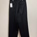 Black slacks size M, made of polyester.