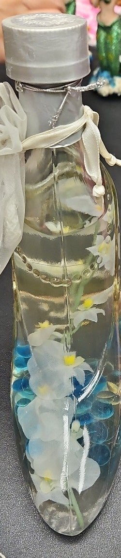 Glass boot with flowers