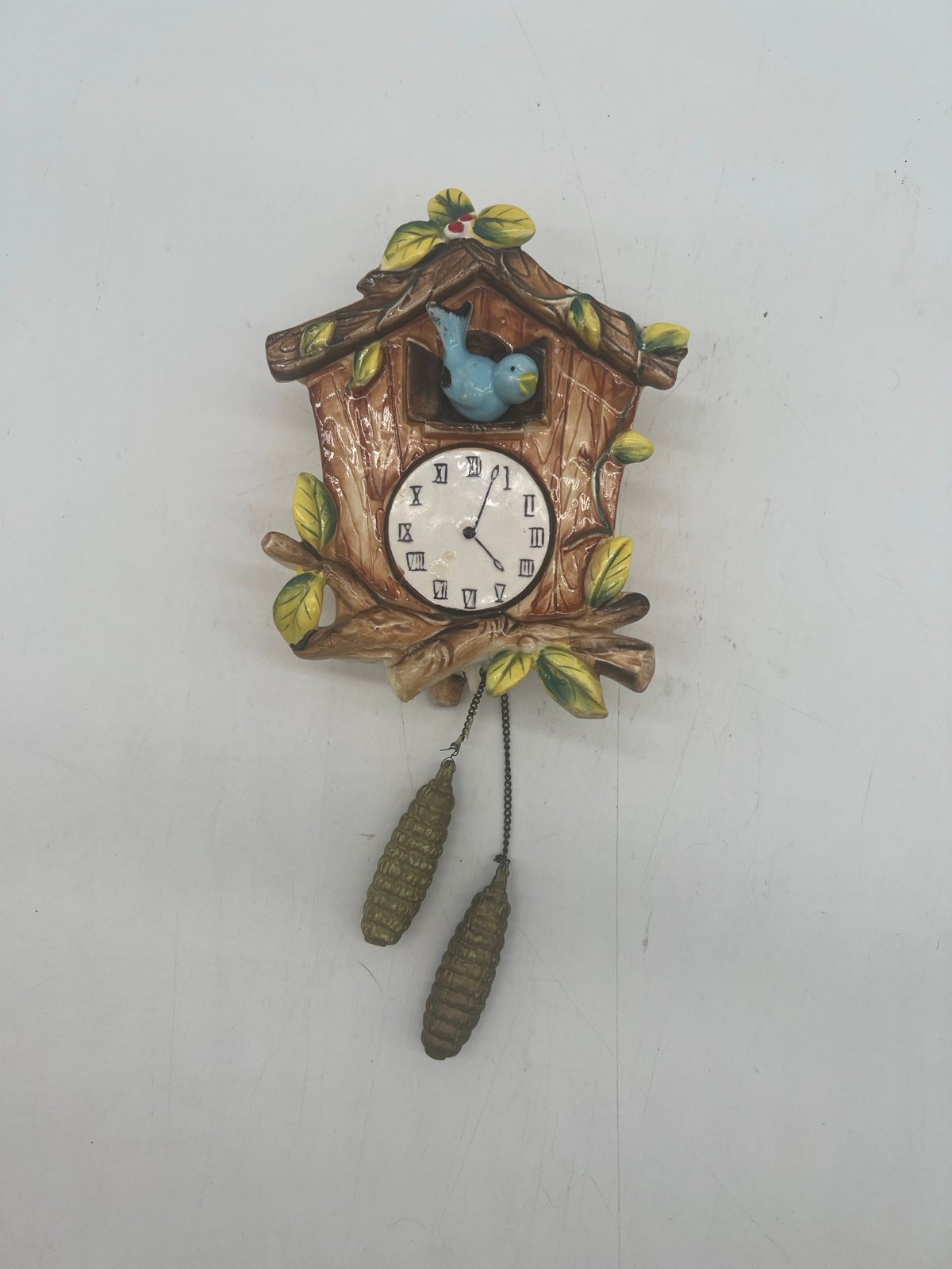 Vintage coo coo clock wall pocket