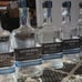 6 - Brand New Empty Corked Glass Half Gallon Bottles of Top Quality Tequila
