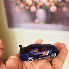 Hot Wheels Skyline Lot of 2 Red & Purple