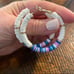 New White/blue/gold hoop earrings.