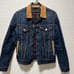 Denim jacket with corduroy collar.