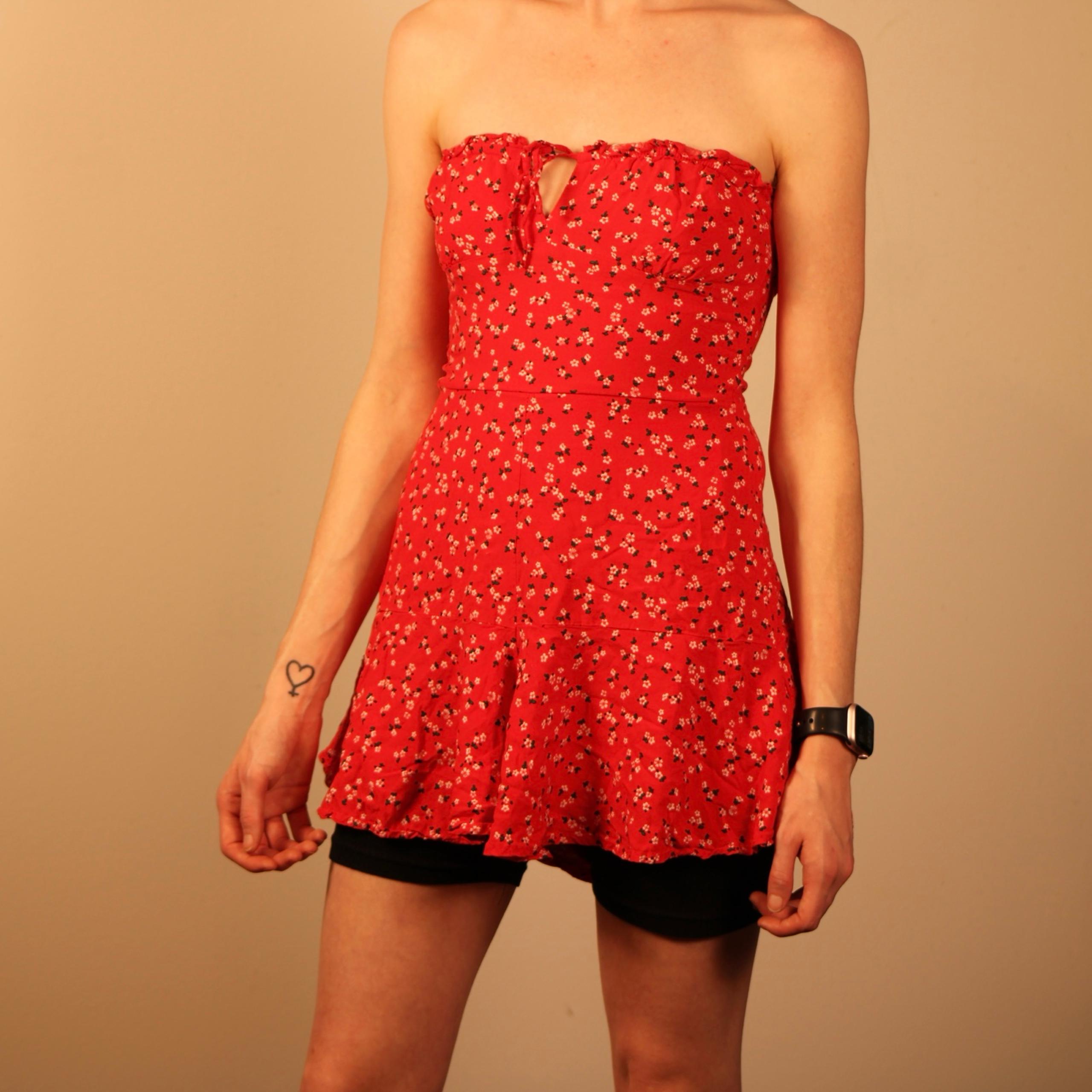 Red floral strapless romper