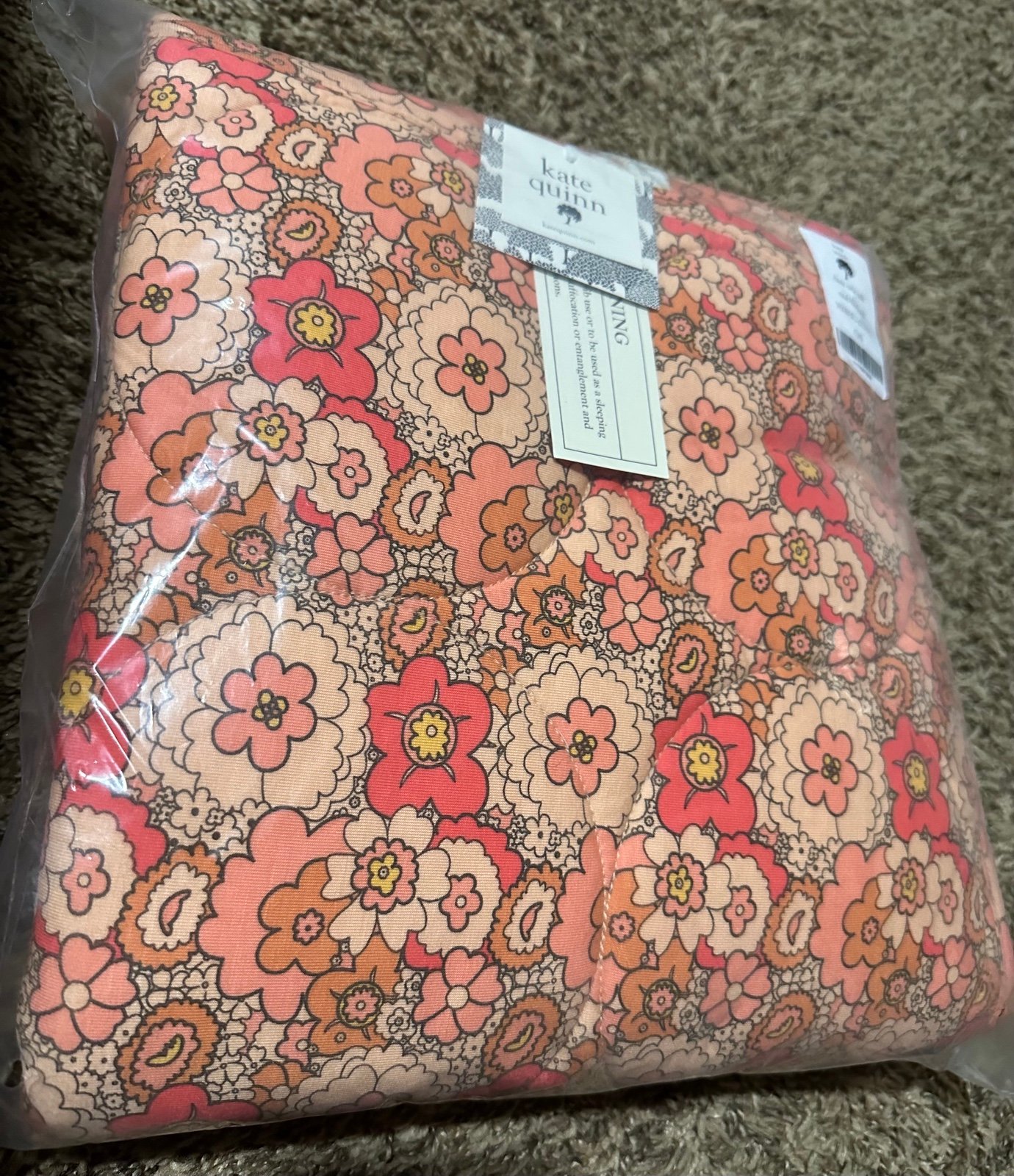 Kate Quinn mod 60s floral quilt