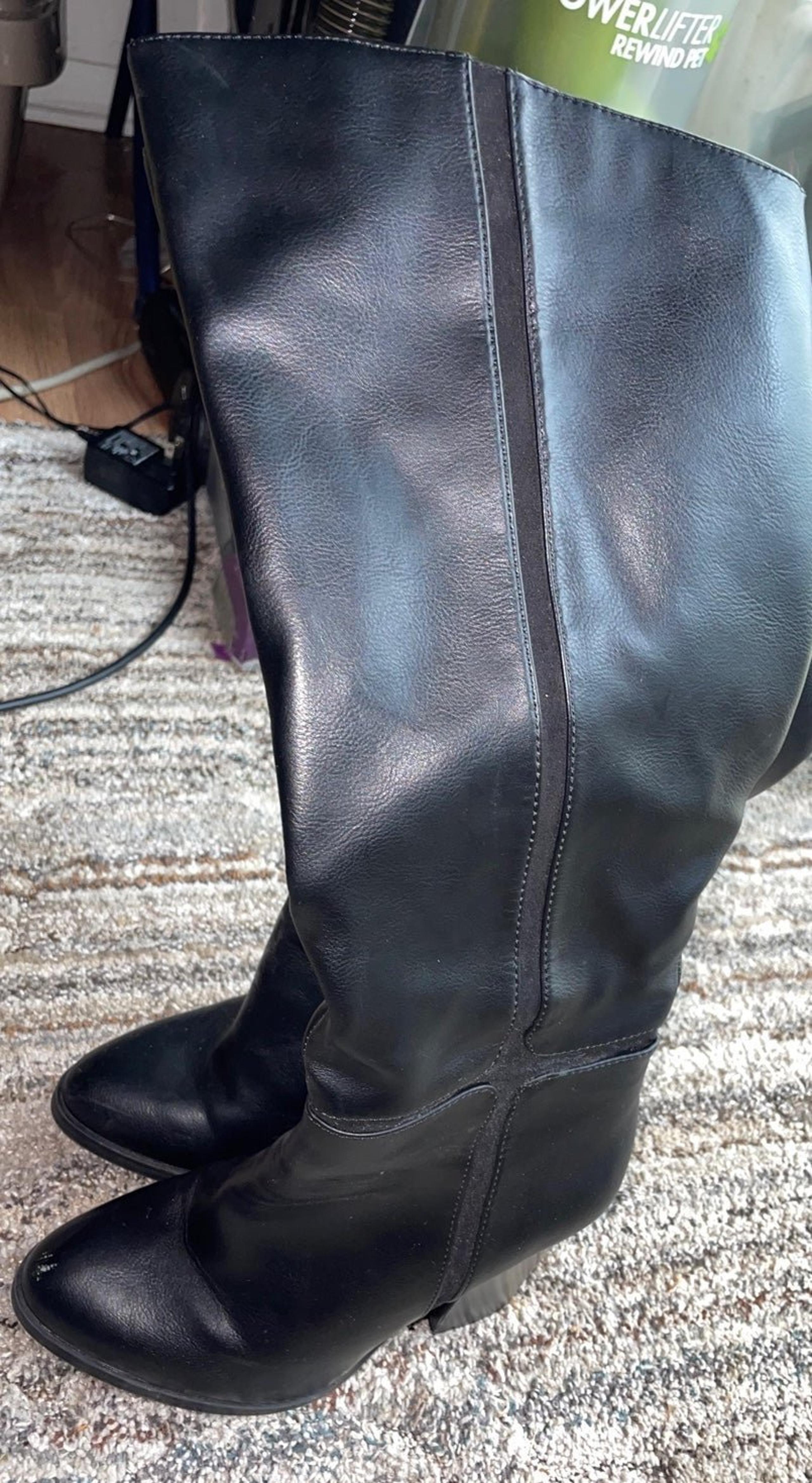 Black high heeled knee high boots size 7.5