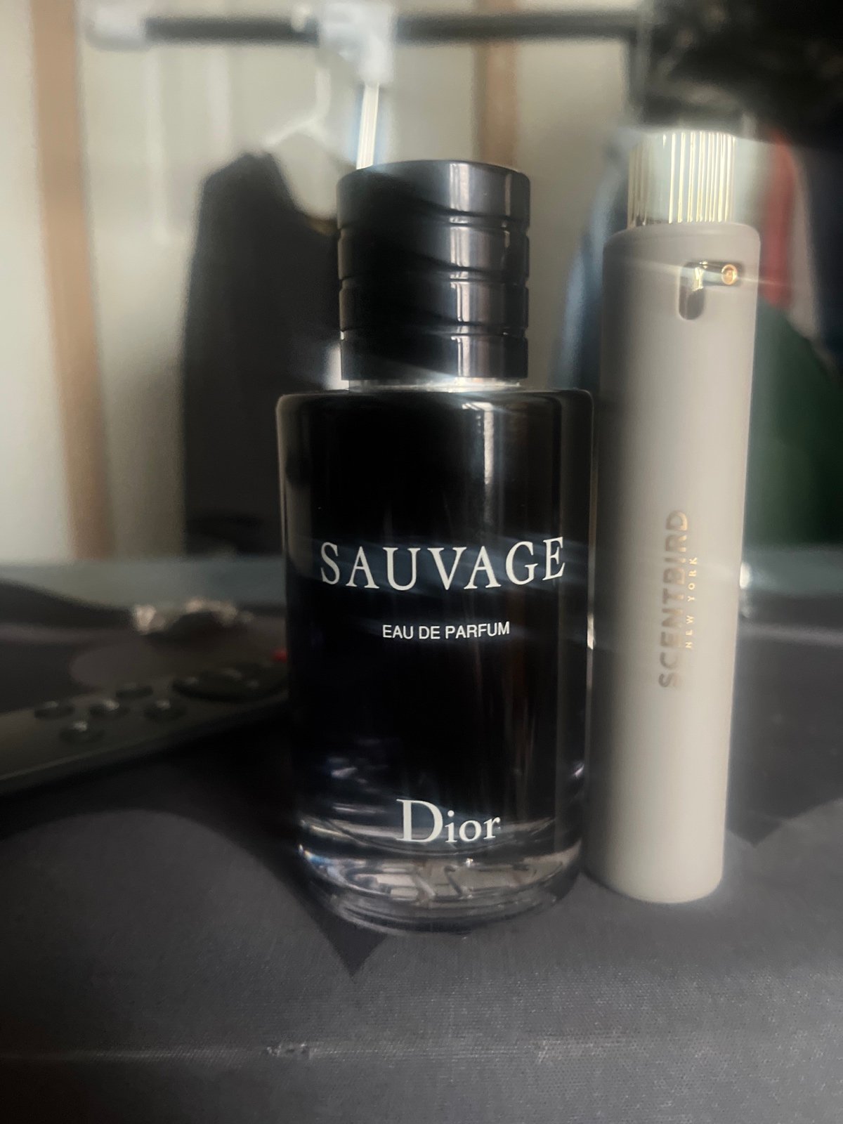 Door sauvage edp with Lacoste cologne 8ML the sauvage has 60 percent left