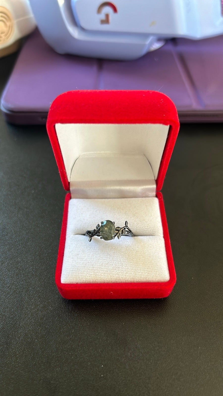 1.3 Carat Oval Cut Moss Agate Ring in a 18K Black Gold Setting
