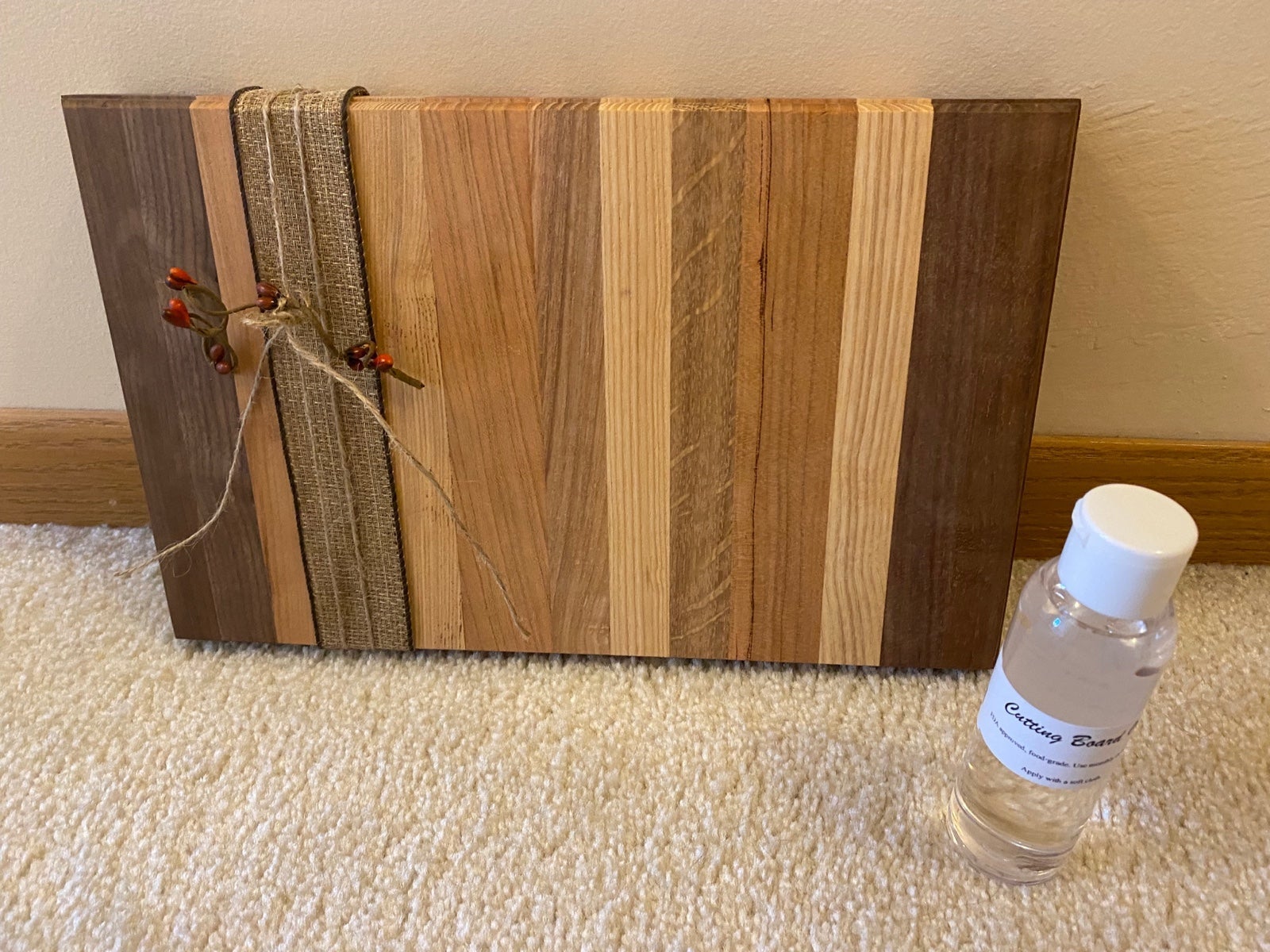 New multi wood board with board oil. Never used!