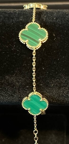 Brand new 14k gold Clover bracelet