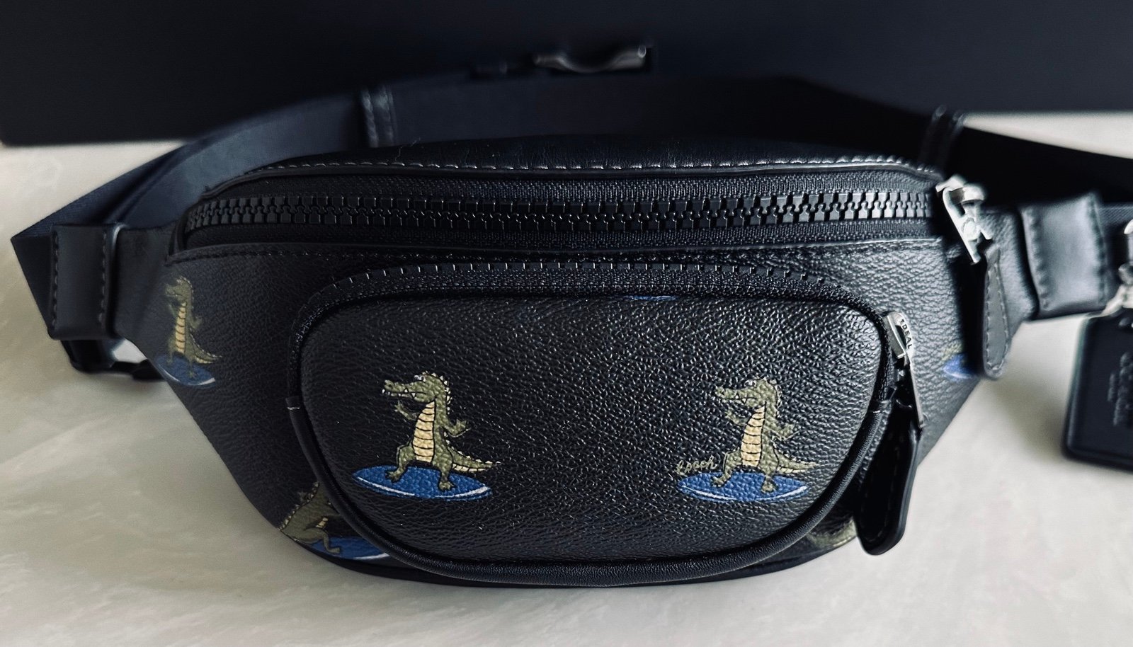 Coach dinosaur deals fanny pack