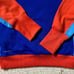 NIKE WOMEN’S SIZE SMALL BLUE & ORANGE THERMA-FIT HOODIE