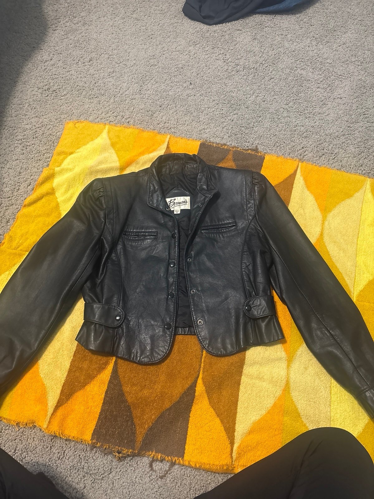 Berman’s black leather jacket