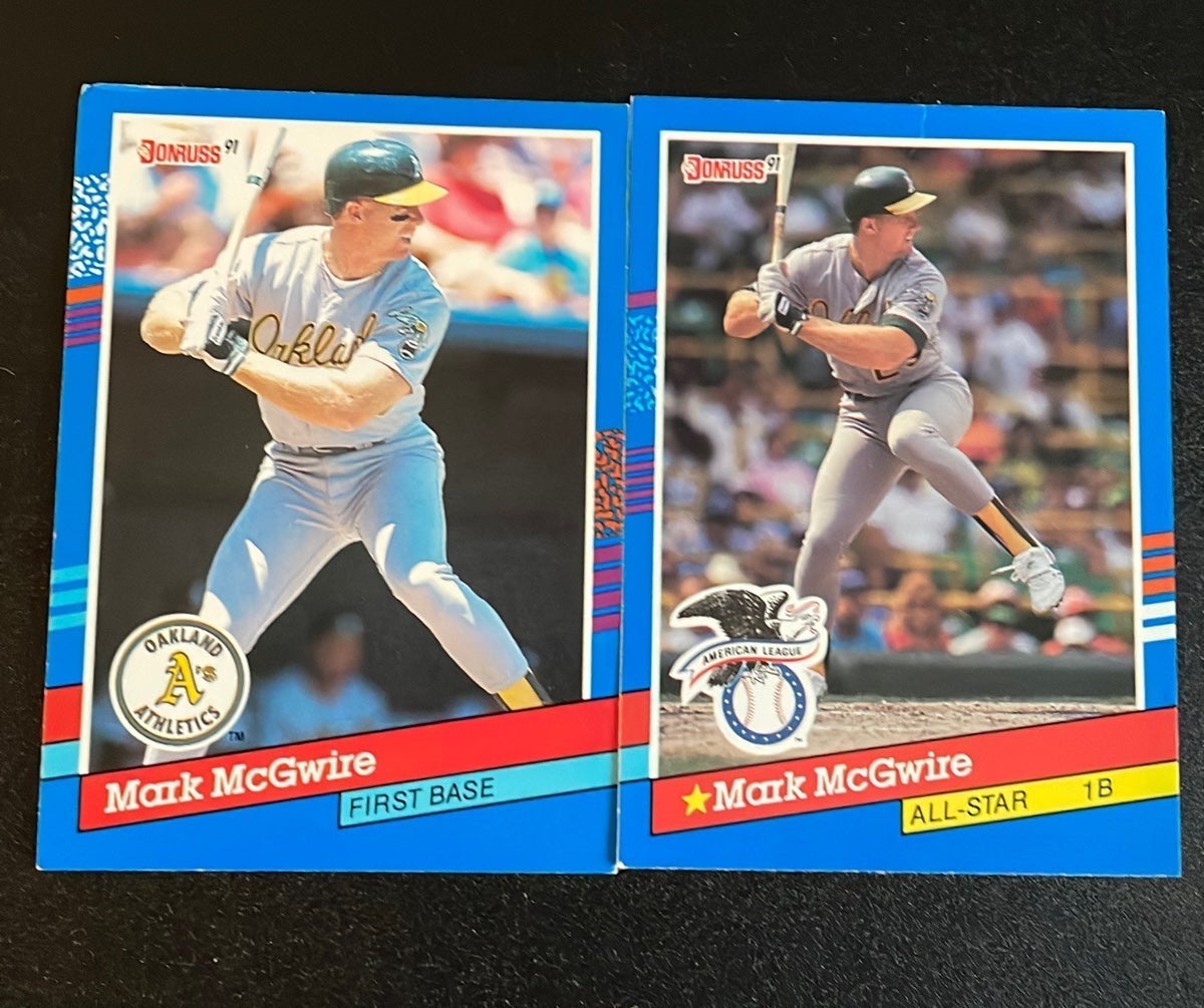 Two Mark McGwire Error Cards