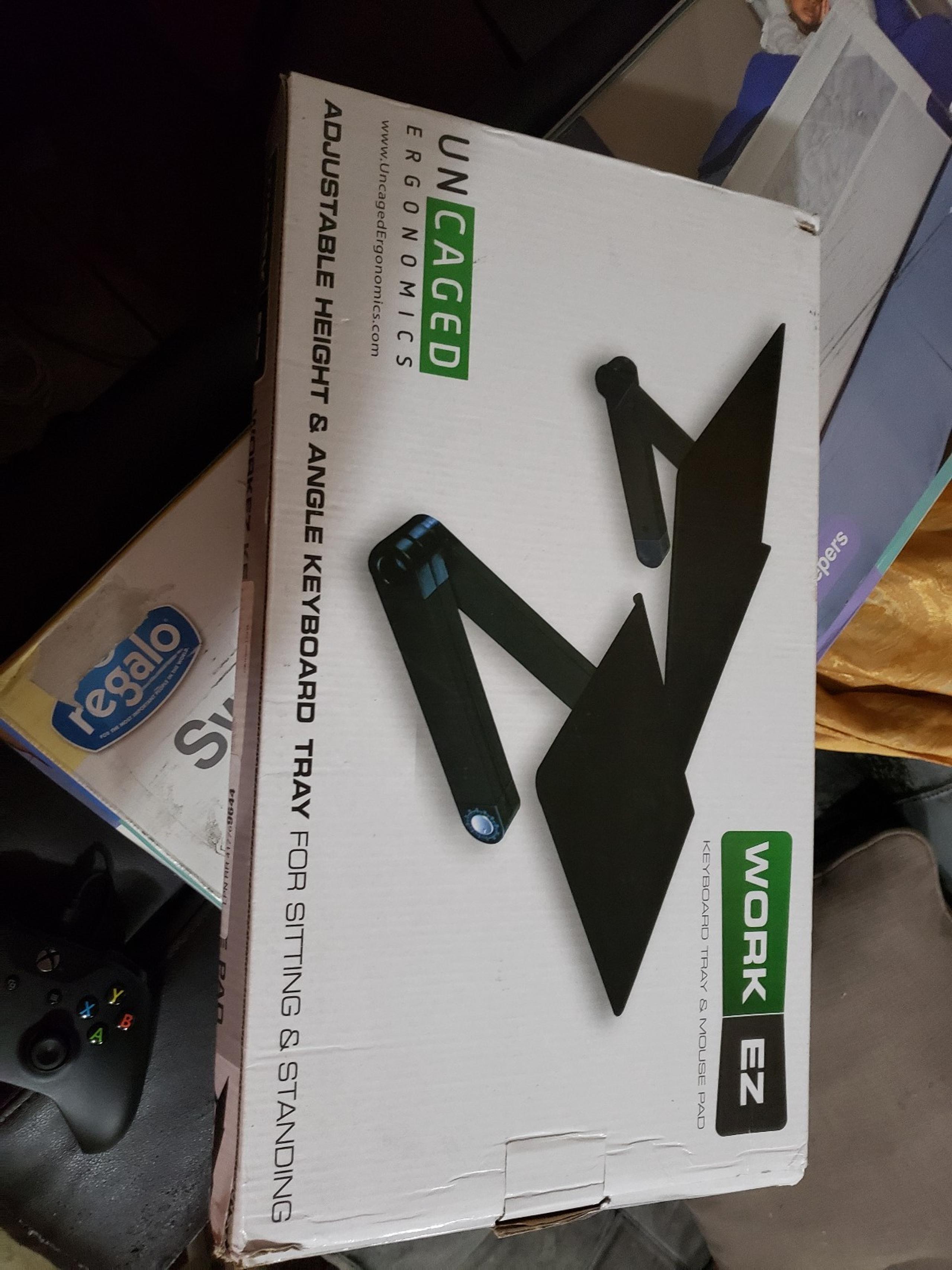 Adjustable keyboard and mouse tray