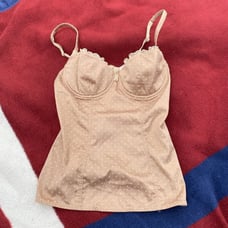 Intimissimi - nude bustier top with a bow at the center of the chest. Tagged a w