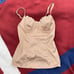 Intimissimi - nude bustier top with a bow at the center of the chest. Tagged a w