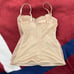 Intimissimi - nude bustier top with a bow at the center of the chest. Tagged a w