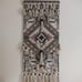 Boho wall hanging with aztec design