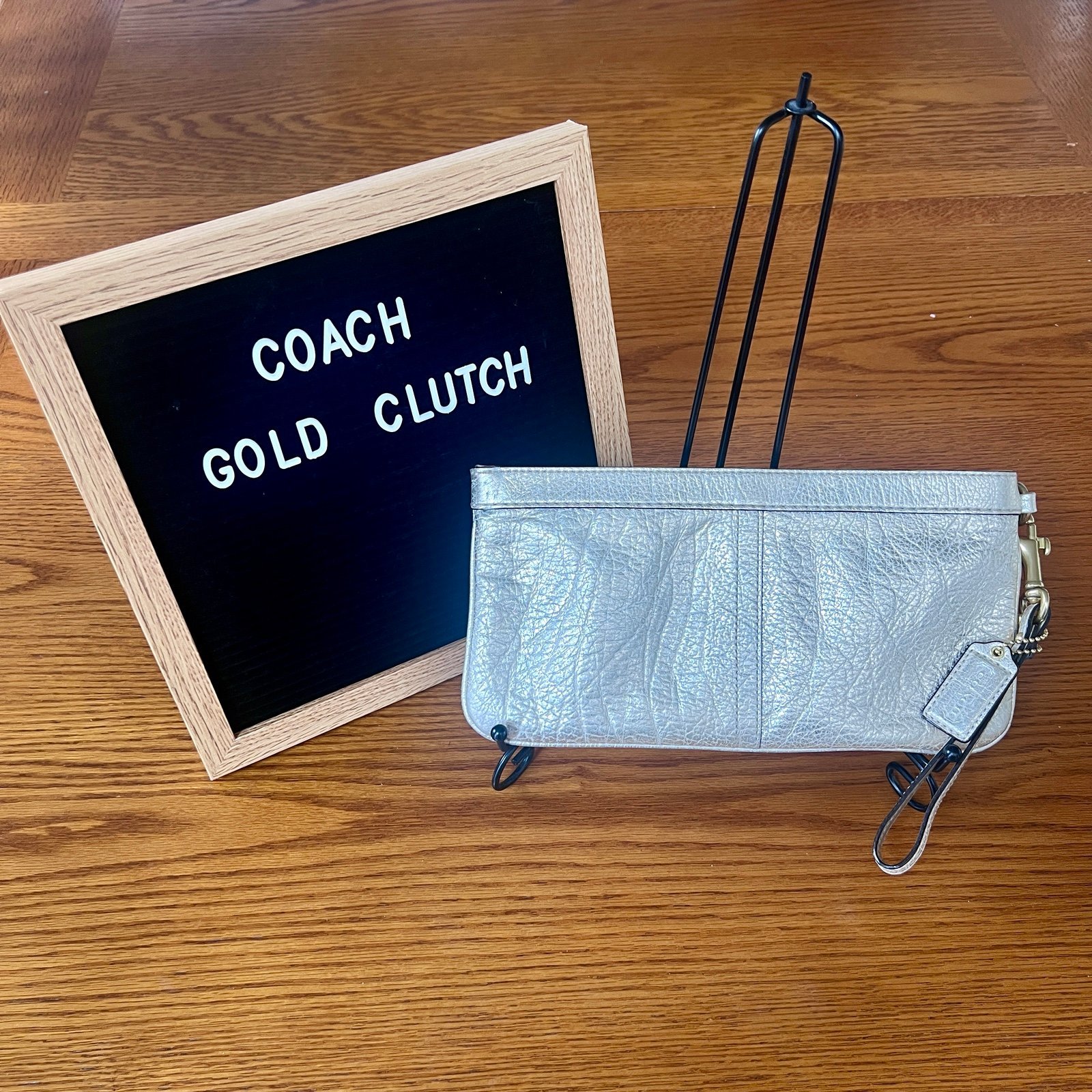 Coach gold clutch