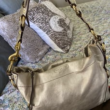 Authentic Coach gold satchel handbag.