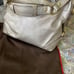 Authentic Coach gold satchel handbag.