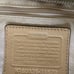 Authentic Coach gold satchel handbag.