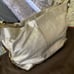 Authentic Coach gold satchel handbag.