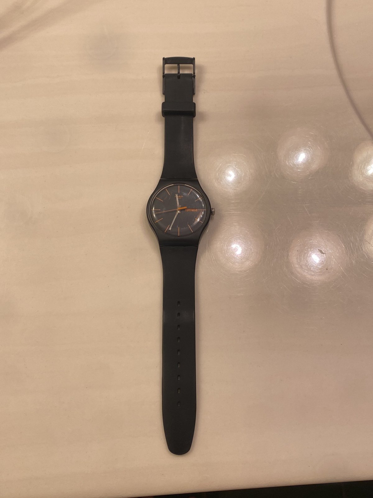 I am selling and black and orange swatch watch Dark Rebel Men s